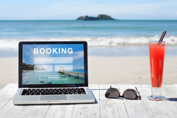 travel booking, hotels and flights reservation on internet travel booking, hotels and flights reservation on the screen of computer flight air tickets cheap stock pictures, royalty-free photos & images