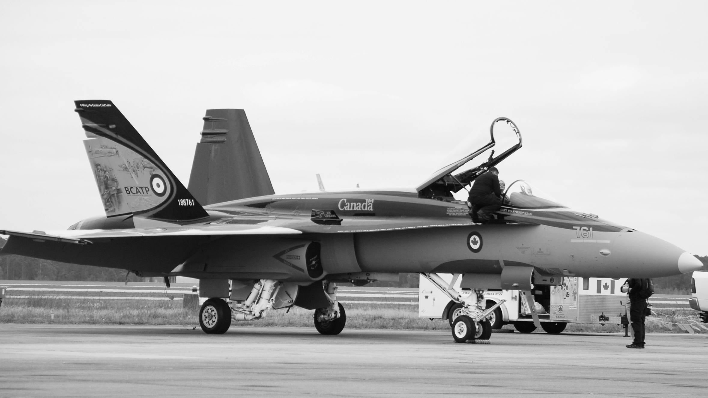 grayscale photo of fighter jet