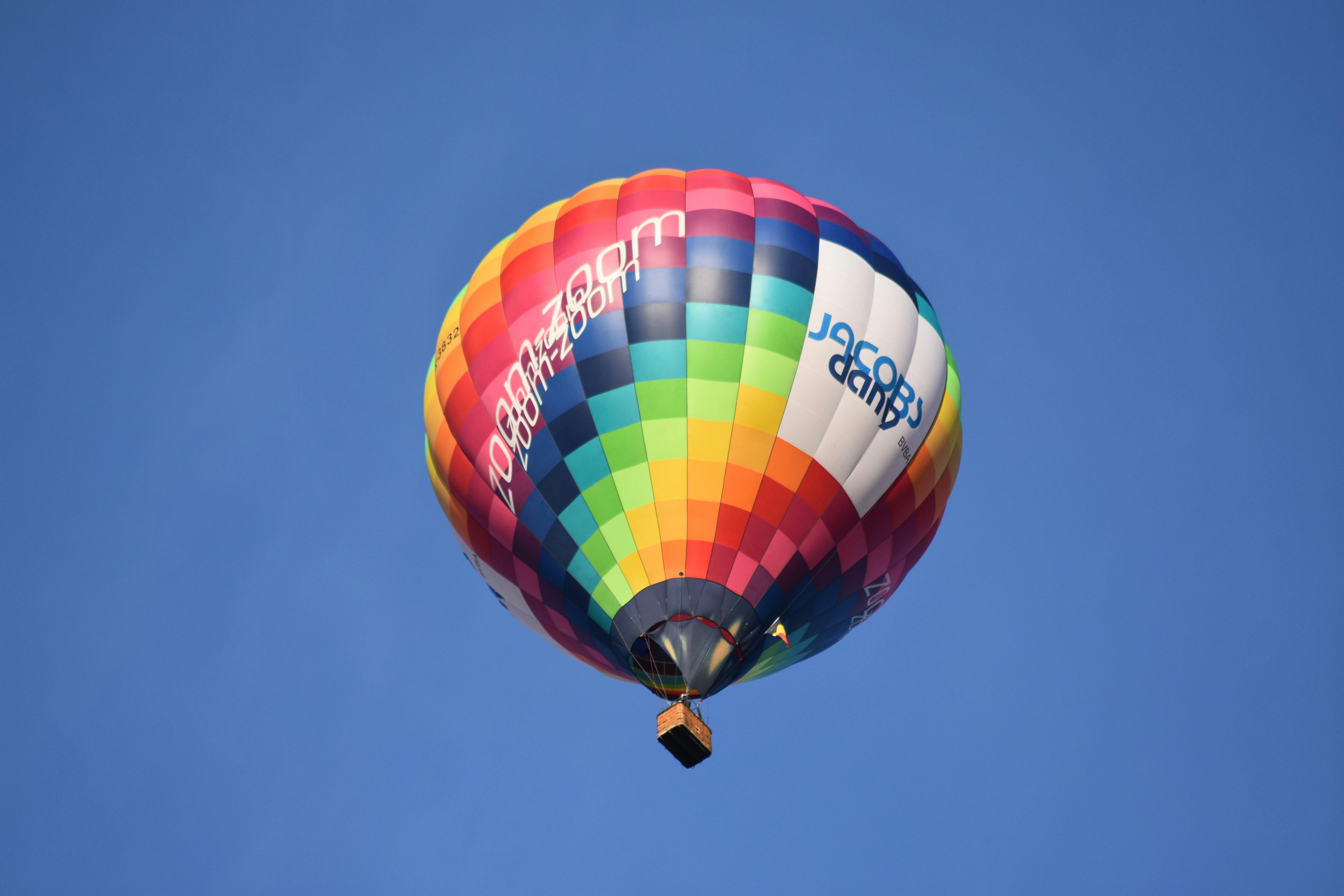 an airborne colorful hot air balloon