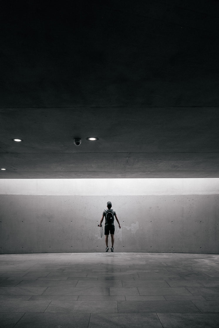 Man Jumps In Paved Room